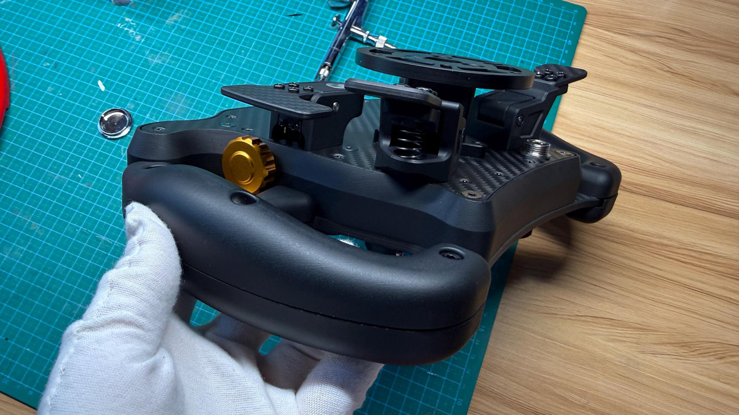 LMP2 Pro sim racing wheel — carbon fiber paddle shifters detail